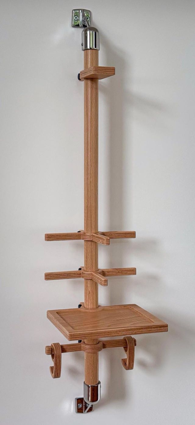 Bike Gear wall mount in wood and stainless steel, mounted on a wall