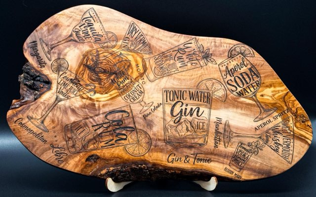 Olive wood serving board engraved with cocktail recipes