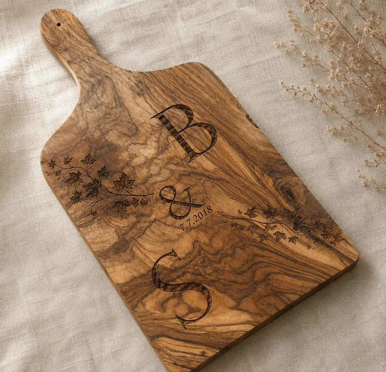 Olive wood board with ivy engraving, initials and date